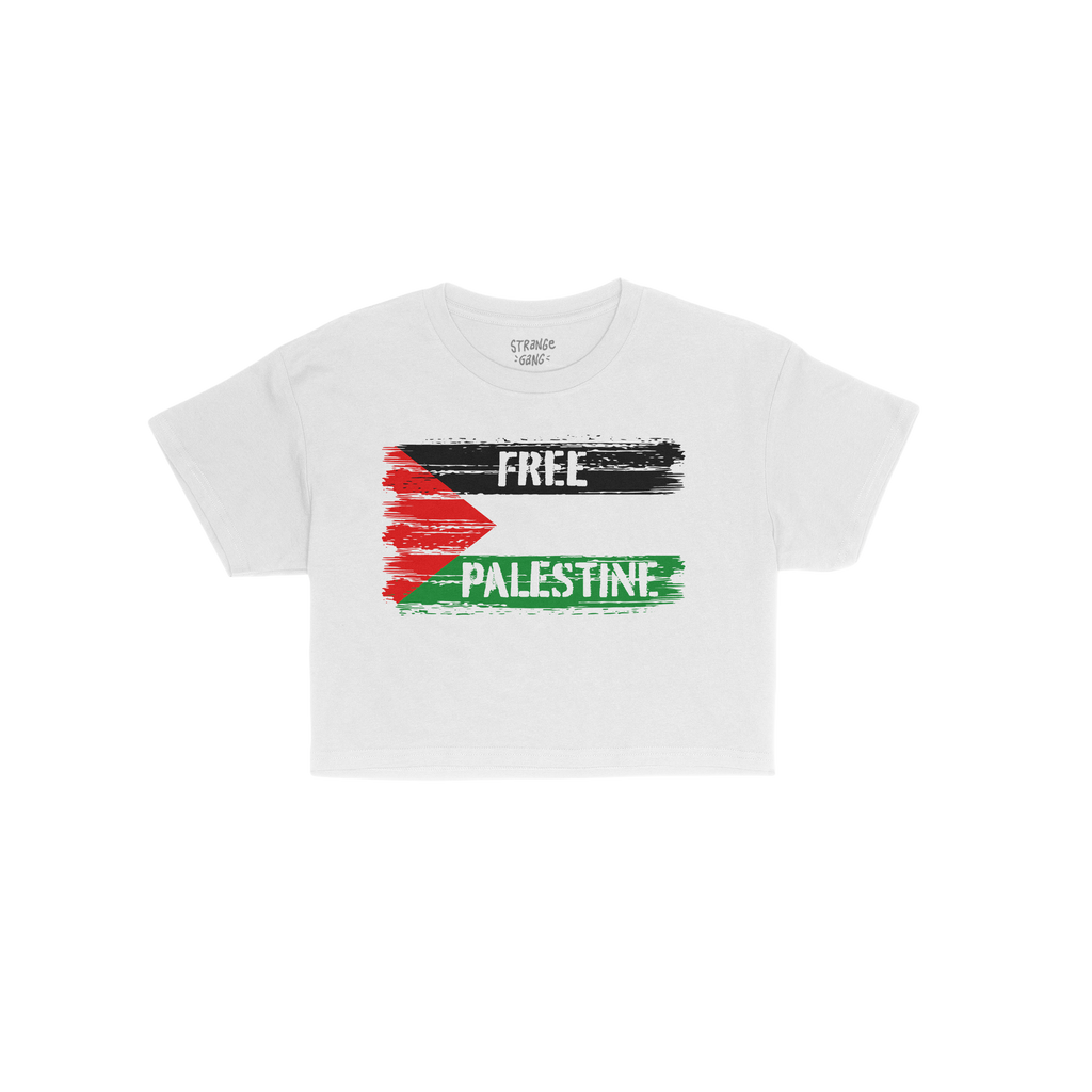 Free Palestine Women's Baby Tee featuring a distressed-brush-stroke Palestinian flag graphic with FREE and PALESTINE text, em