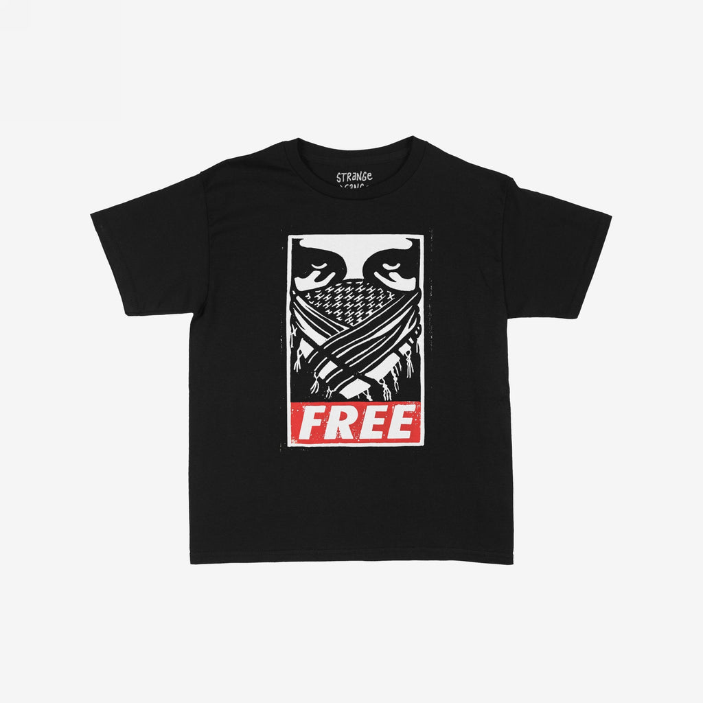 Free Palestine JULZ Women's Baby Tee features a bold graphic of eyes over a patterned scarf, with FREE in red, symbolizing solidarity with Palestinian freedom. The ink has a textured street poster style.