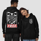 Two people model the Free Palestine JULZ Hoodie, featuring a masked face graphic and FREE text on the back, and a small front logo, symbolizing activism and solidarity.