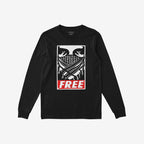 Free Palestine JULZ T-shirt featuring a black-and-white illustrated face wrapped in a patterned scarf, with crossed arms, and the bold word FREE in a red rectangle below.
