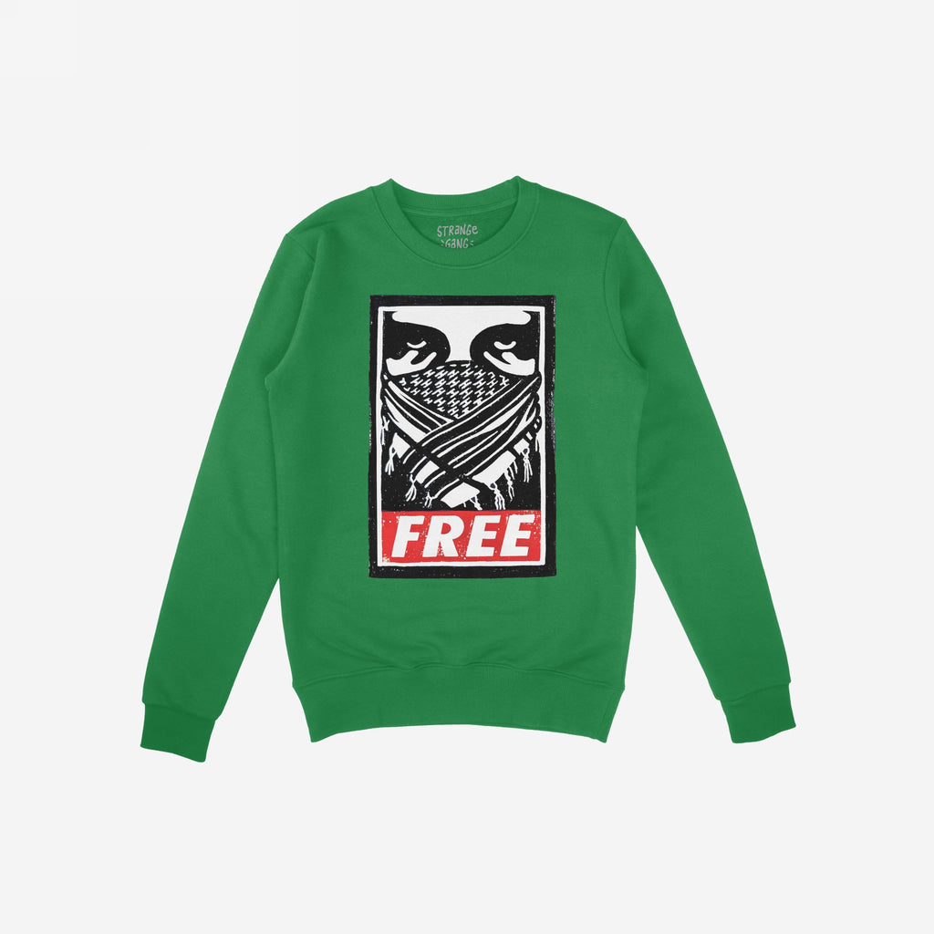 Free Palestine JULZ Hoodie & Sweatshirt features a bold graphic of eyes above a keffiyeh-style face covering with crossed objects, and the word “FREE” below, symbolizing support for Palestinian freedom.