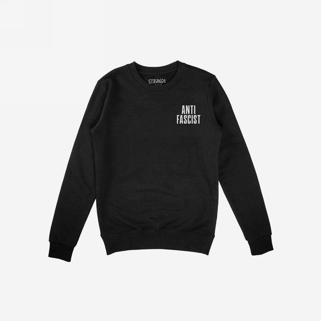The image shows the Fuck 'Em All Back Print Shirt, a black sweatshirt with ANTI FASCIST on the chest, symbolizing resistance and activism.