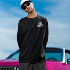 Young person in a Fuck 'Em All Back Print Shirt, featuring ANTI FASCIST on the front, epitomizing protest-ready style with bold messaging, aligning with anti-fascism and equality advocacy.