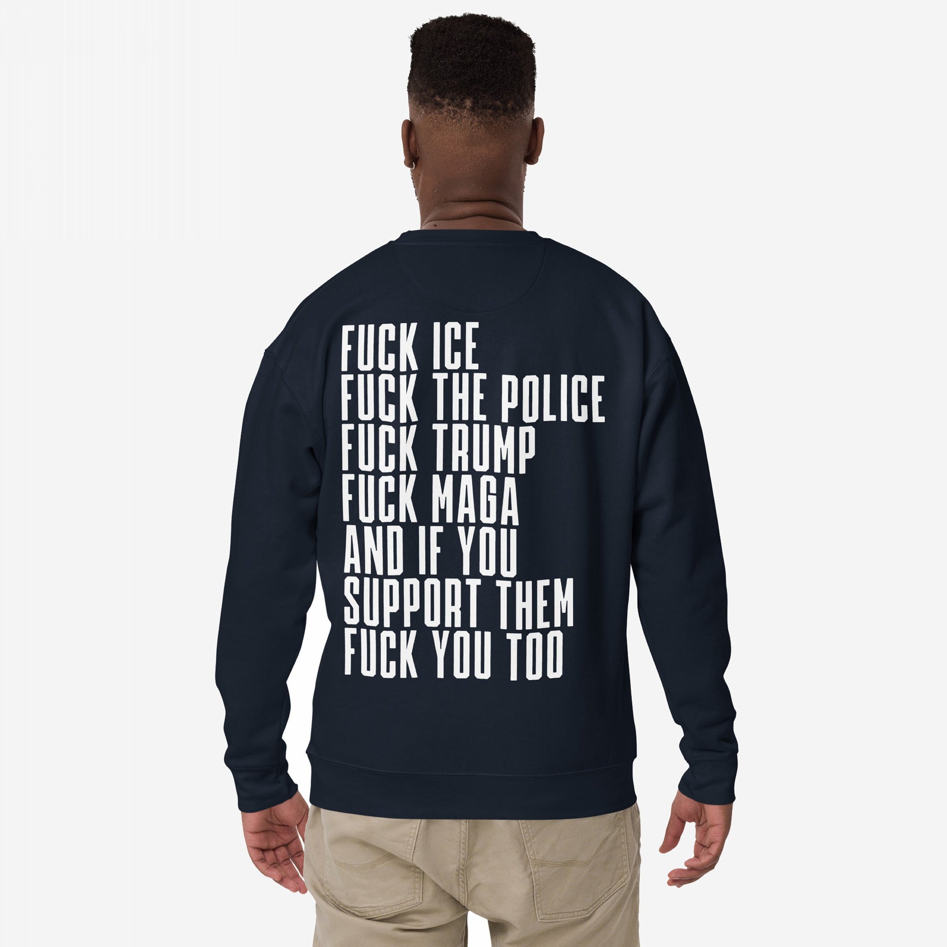 Person seen from behind wearing the Fuck 'Em All Back Print Hoodie & Sweatshirt with bold protest text against ICE, police, Trump, and MAGA. A powerful statement piece challenging fascism and oppression.