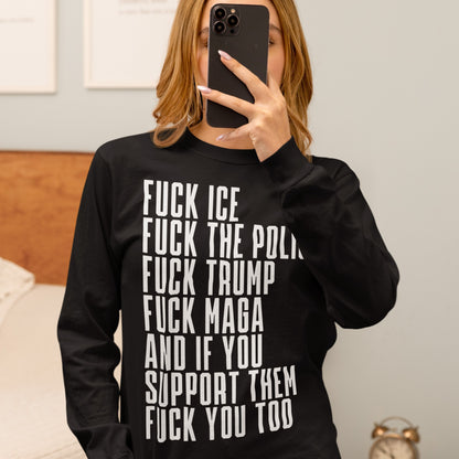 A person takes a mirror selfie wearing the Fuck 'Em All T-shirt, featuring bold, vertical anti-authoritarian statements in white text, covering their face with a smartphone.