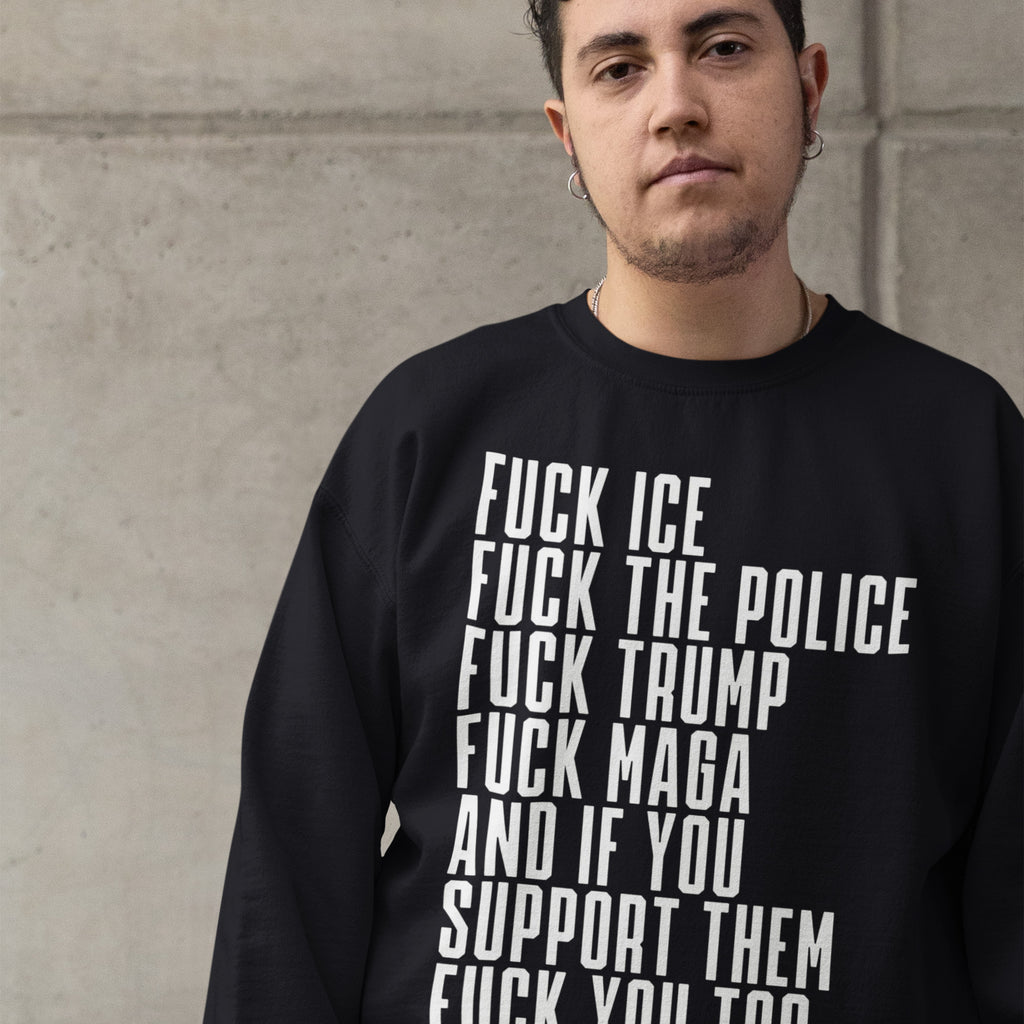 Person wearing the Fuck 'Em All Shirt featuring bold anti-fascist statements. Ethically printed in a unisex fit, this shirt reflects defiance and solidarity, supporting equality and opposing racism and authoritarianism.