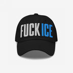 Black baseball-style cap with “FUCK ICE” in bold 3D puff embroidery; “FUCK” is white, “ICE” blue, capturing a rebellious spirit.