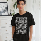 Young person indoors wearing a Fuck ICE Pattern T-shirt, featuring a bold, repeating slogan advocating against ICE, aligning with themes of equality and anti-fascism. Ideal for political visibility.