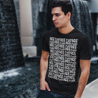 Young man wearing a Fuck ICE Pattern T-shirt stands before a tiered fountain. The shirt's front features a bold, dense repetition of the slogan, emphasizing a strong political stance.
