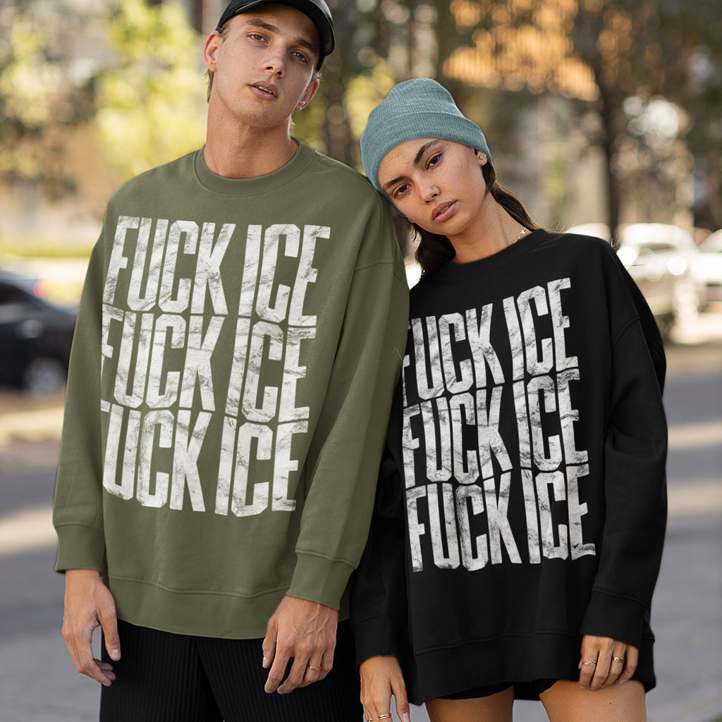 Two models showcase the Fuck ICE Sweatshirt, featuring bold, distressed block letters. One wears olive green, the other black, standing in an urban setting.