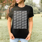 Woman outdoors in denim shorts wearing the Fuck IDF Pattern Women's Baby Tee, featuring a bold text design. The shirt showcases a retro, fitted Y2K style, aligned with anti-war, pro-human rights messaging.