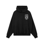 Black pullover hoodie with front kangaroo pocket and drawstring hood, featuring a small white STRANGE JULZ graphic. Part of t