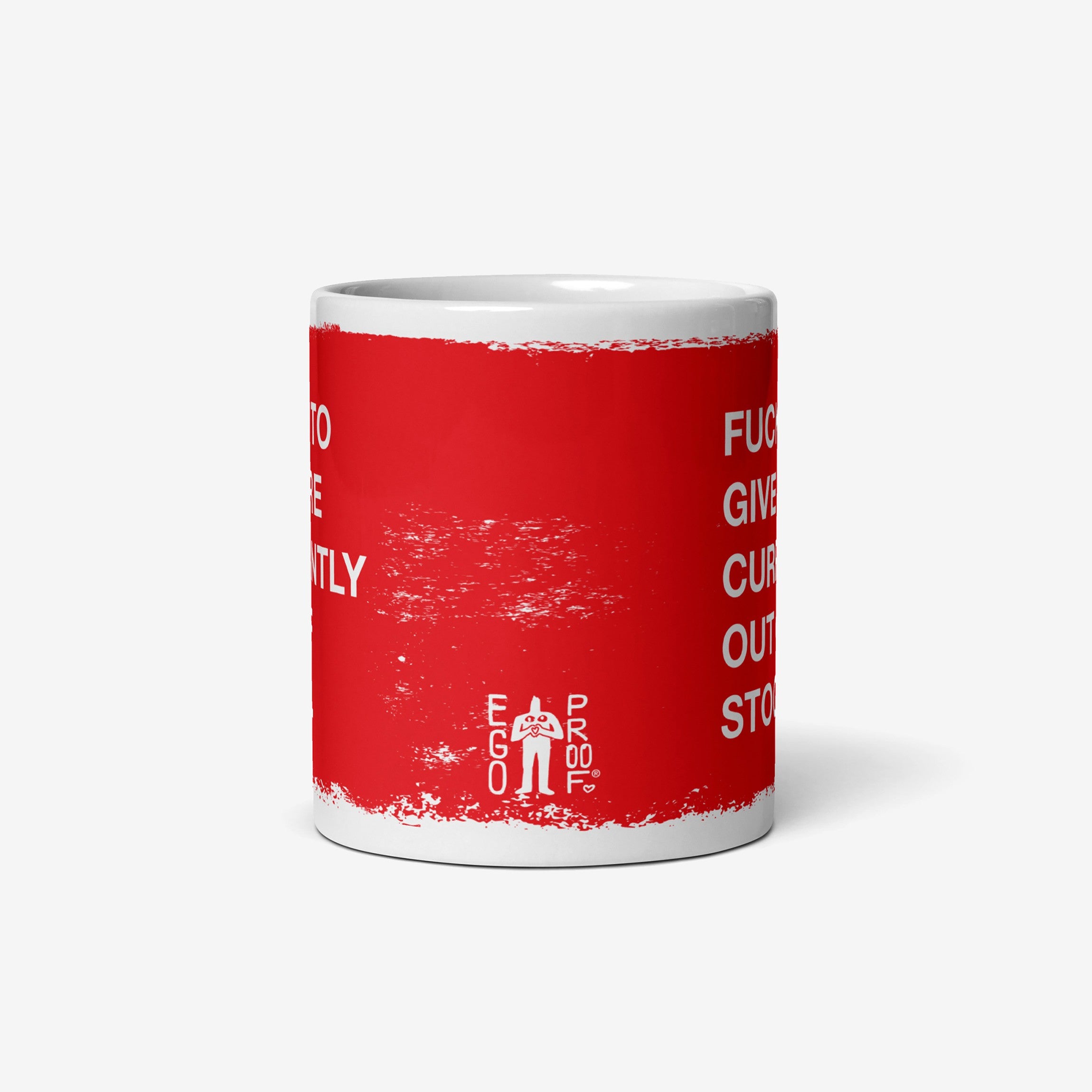 Fucks To Give Mug featuring a distressed red band with a partially visible slogan and an EGO PROOF logo. This ceramic mug offers a bold, unapologetic statement, embodying a no-nonsense attitude.