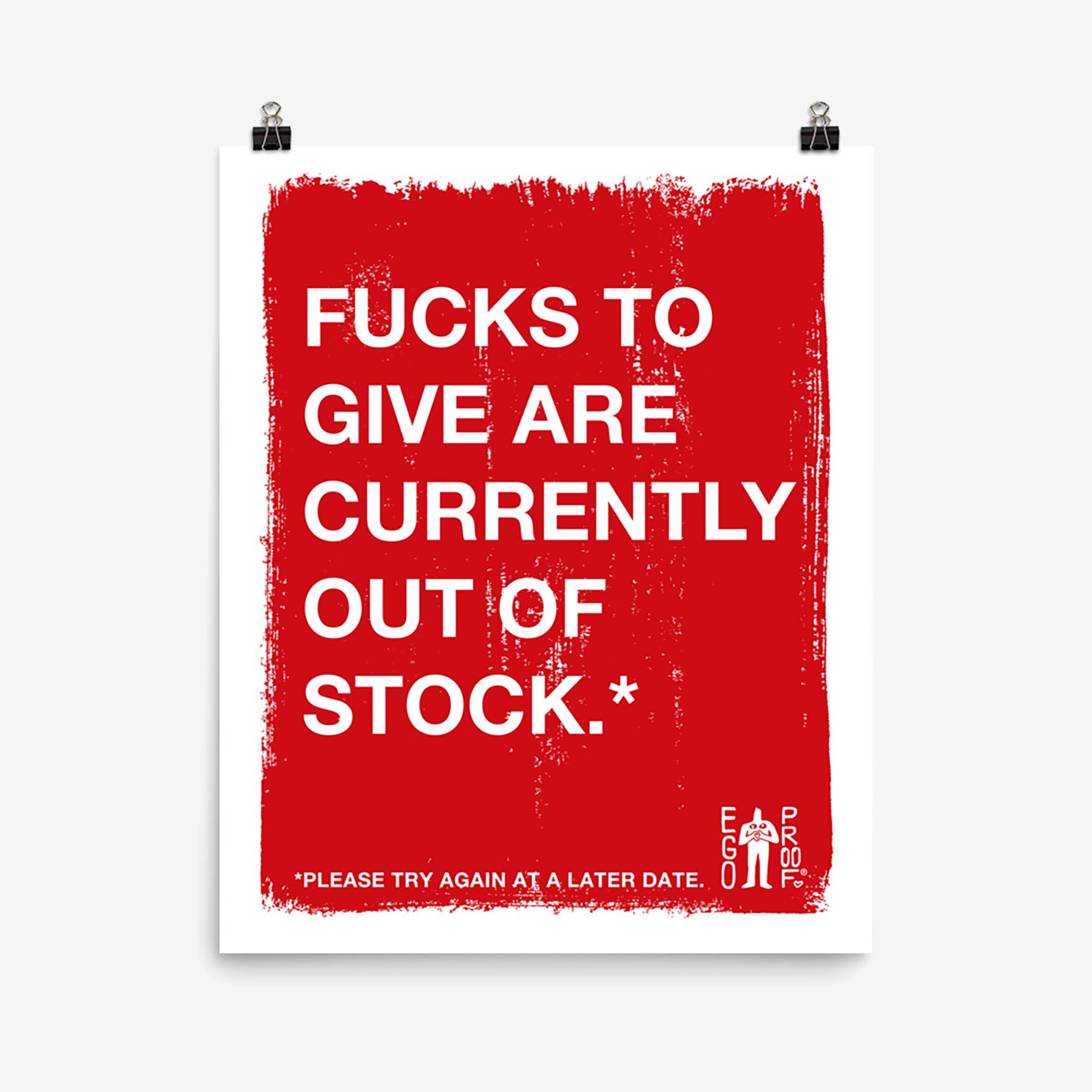 Fucks To Give Giclée Print features bold white text on a red background, humorously stating Fucks to give are currently out of stock, with a footnote, adding a touch of sarcastic honesty.