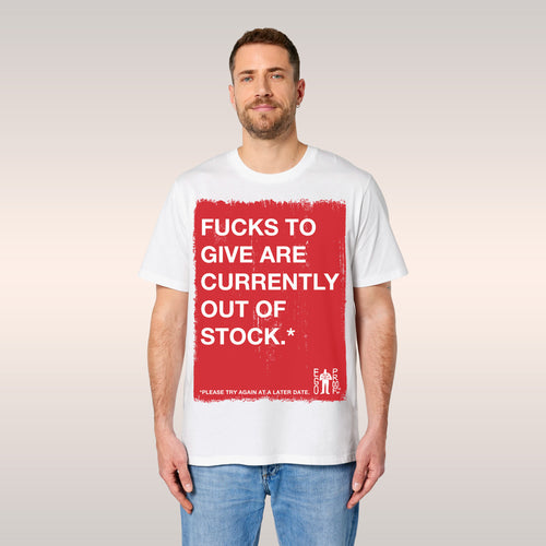 Young man wears a white Fucks To Give T-shirt with bold red square and cheeky message, embodying a carefree, realistic attitu