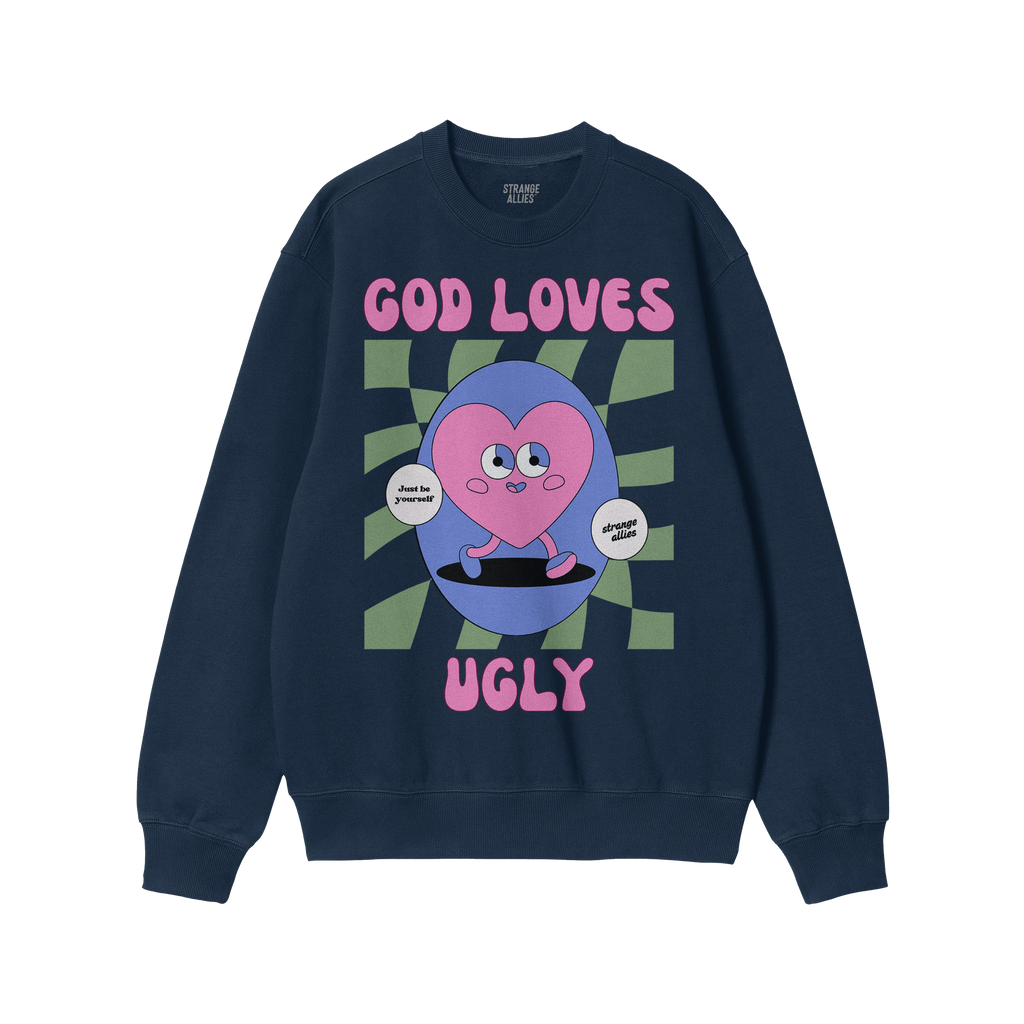 Navy-blue crewneck sweatshirt featuring the God Loves Ugly design. Retro-cartoon heart with Just be yourself and allies speec