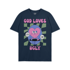 God Loves Ugly T-shirt featuring a cartoonish pink heart character with affirmations, embodying a bold, inclusive message of 