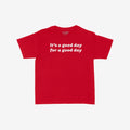 Good Day Women's Baby Tee features bold white lettering on a red crop top, exuding retro optimism with the phrase it’s a good day for a good day, promoting positivity and style.