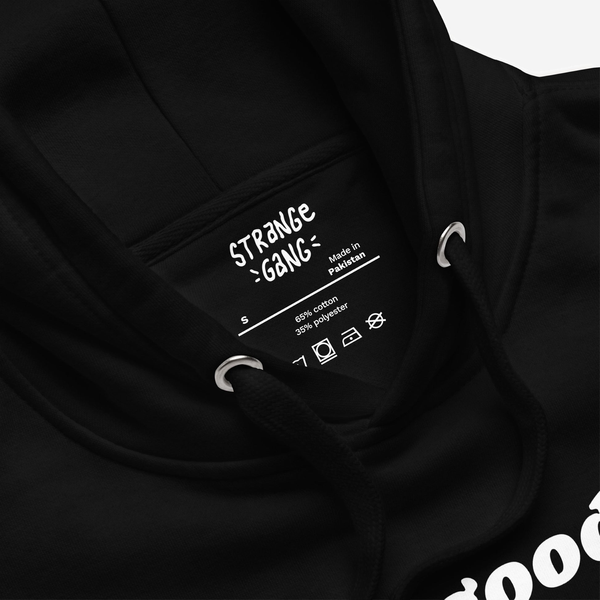 Good Day Hoodie & Sweatshirt features a bold “STRANGE GANG” label, black drawcords, and metal eyelets. Made in Pakistan, blending comfort with a message of everyday optimism.