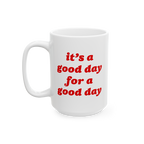 White ceramic Good Day Mug featuring red, stylized text: “it’s a good day for a good day.” Ideal for gifting, the mug b