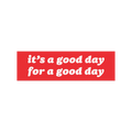 Good Day Sticker & Magnet displayed over a bustling crowd scene, featuring the message it’s a good day for a good day with 