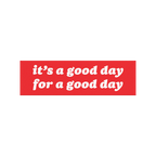 Good Day Sticker & Magnet displayed over a bustling crowd scene, featuring the message it’s a good day for a good day with 