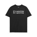 Black crew-neck Good Day Shirt with white, rounded text: it’s a good day for a good day. Embraces positivity and vintage vi