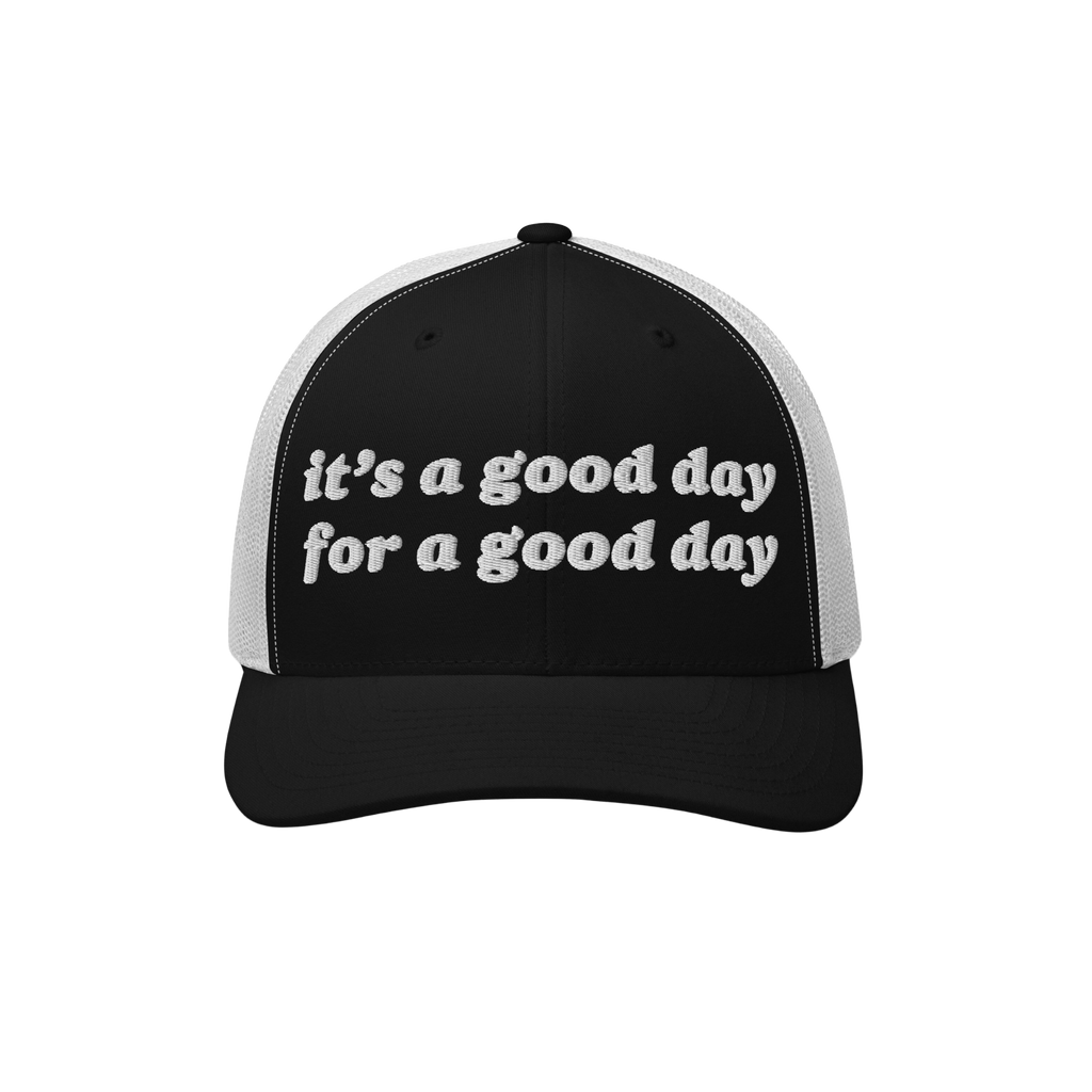 The Good Day Hat features a black front panel with it's a good day for a good day embroidered in white, complemented by a whi