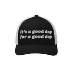 The Good Day Hat features a black front panel with it's a good day for a good day embroidered in white, complemented by a whi