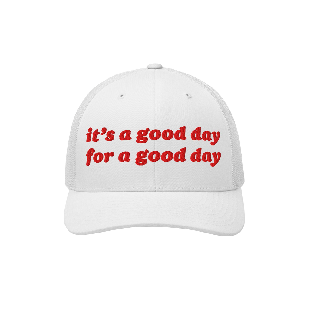 Good Day Hat: A white trucker-style cap with red embroidered text, it’s a good day for a good day, mesh back, and curved br