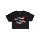 Governed By Criminals Women's Baby Tee: A cropped black tee with a stencil graphic reading “GOVERNED by CRIMINALS,” frame