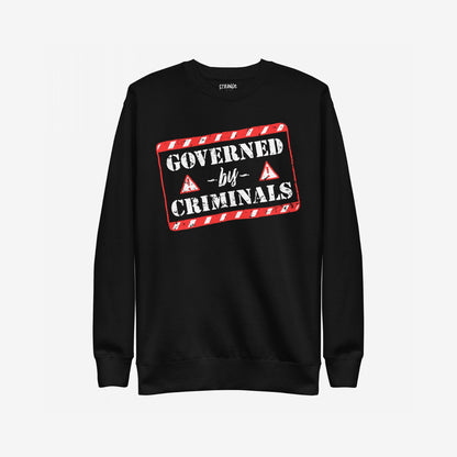Governed By Criminals Hoodie & Sweatshirt features a bold, distressed warning label graphic, highlighting societal issues. The design includes GOVERNED by CRIMINALS with red warning triangles, reflecting protest and resistance.