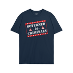 Navy-blue T-shirt featuring a bold, stamp-style graphic with GOVERNED by CRIMINALS text, highlighting a rebellious stance aga