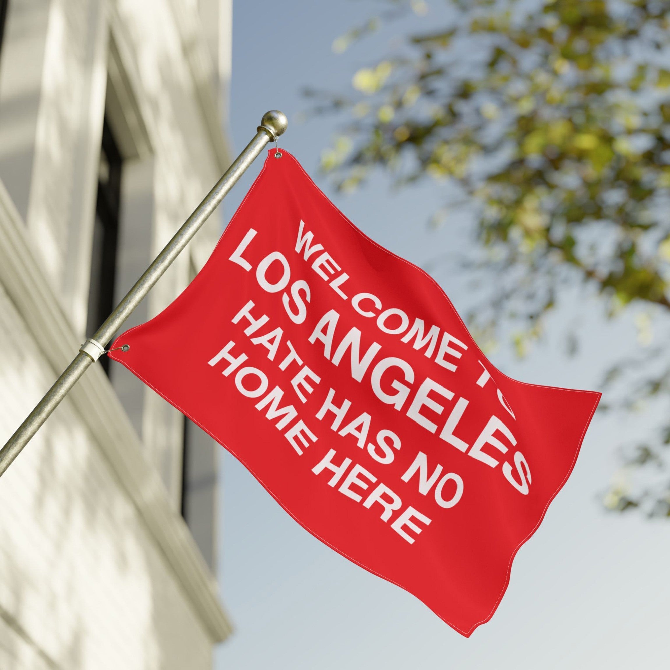 Custom Hate Has No Home Here Flag boldly displays the message against discrimination on a bright red banner, emphasizing community resilience and local impact. Perfect for home or public display.