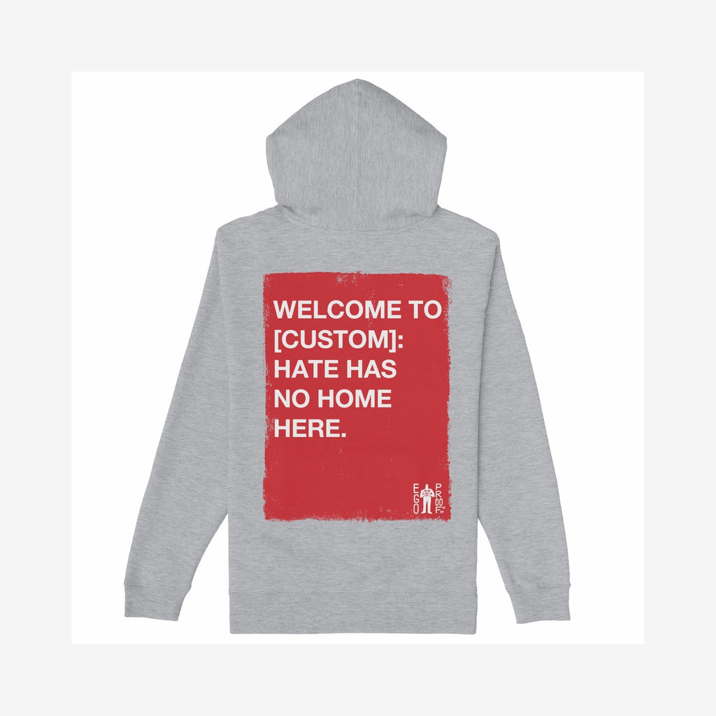 Custom Hate Has No Home Here Hoodie with a red rectangle on the back, featuring bold white text promoting unity. Includes a front EGOPROOF logo for subtle style and activism.