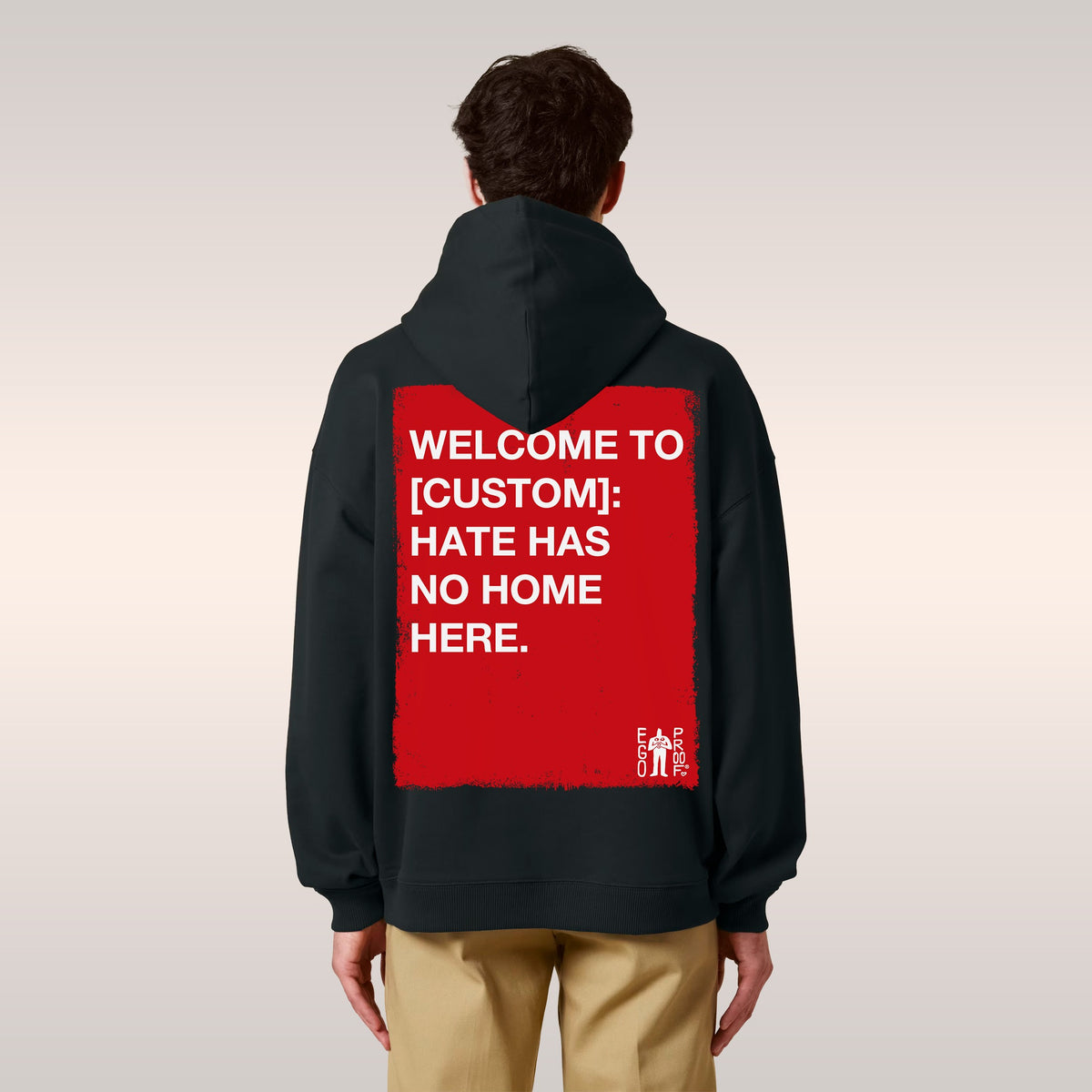 Two people wearing “Custom Hate Has No Home Here Hoodie”; one in a white hoodie with a small “EGO PROD.” logo, the ot