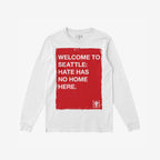 Custom Hate Has No Home Here Long Sleeve T-shirt featuring a bold red square with a message against hate, emphasizing community and equality. Ideal for activism, with “EGO PROOF” logo in the corner.