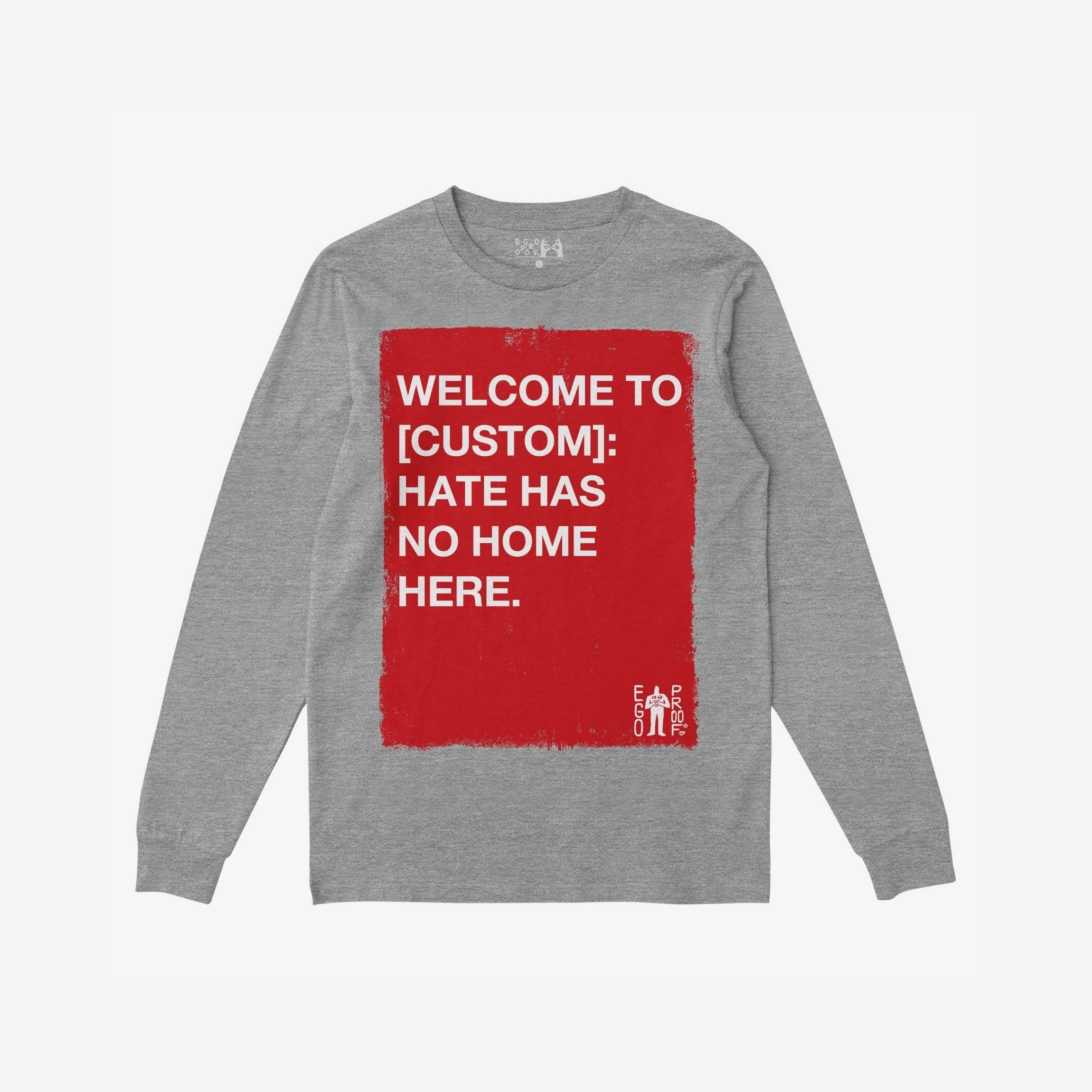 Custom Hate Has No Home Here Long Sleeve T-shirt featuring a bold red square with an inclusive message, designed for comfort and activism, embodying a stand against hate and discrimination.