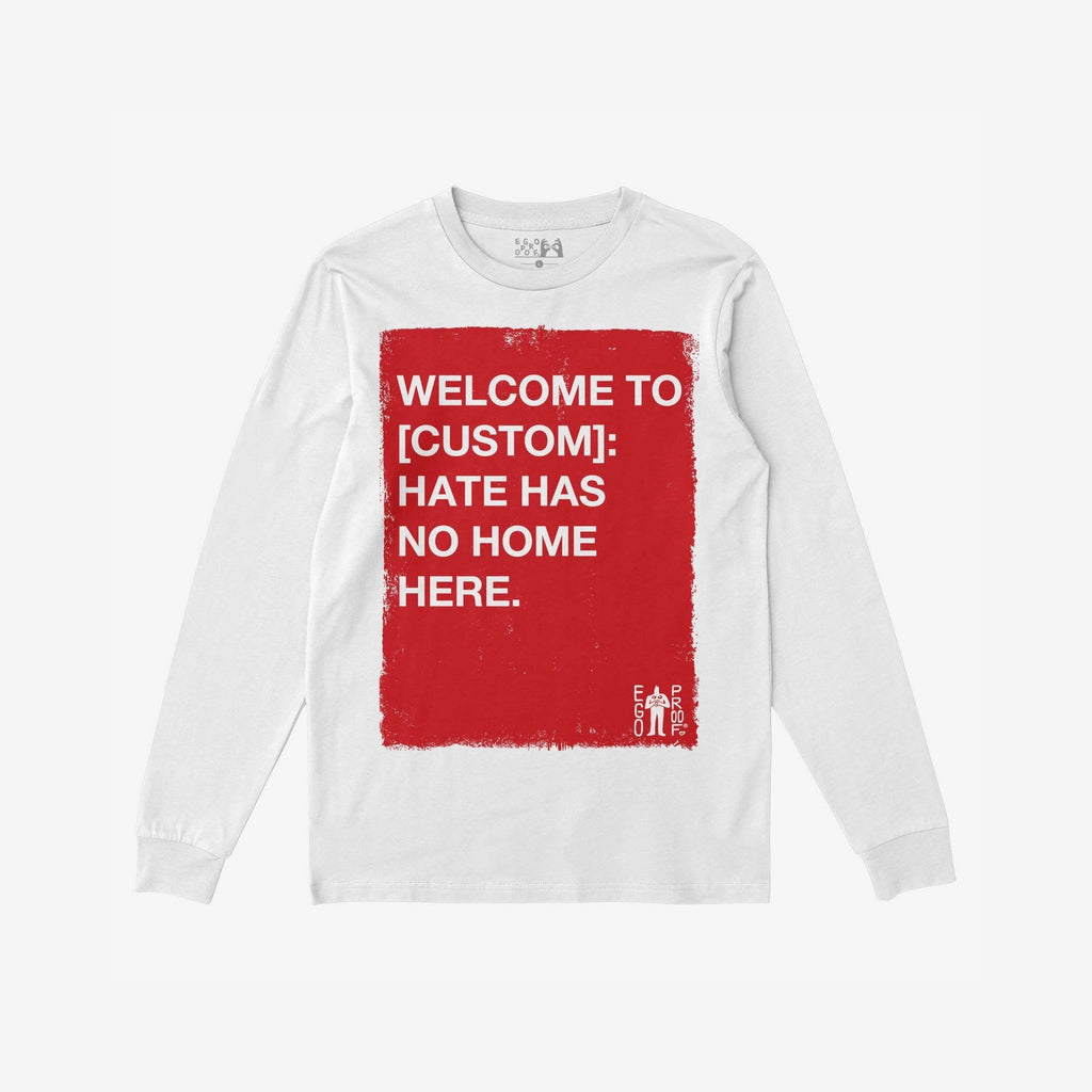 Custom Hate Has No Home Here Long Sleeve T-shirt features a red square with impactful white text promoting equality and unity, perfect for expressing your stance against discrimination and supporting community values.