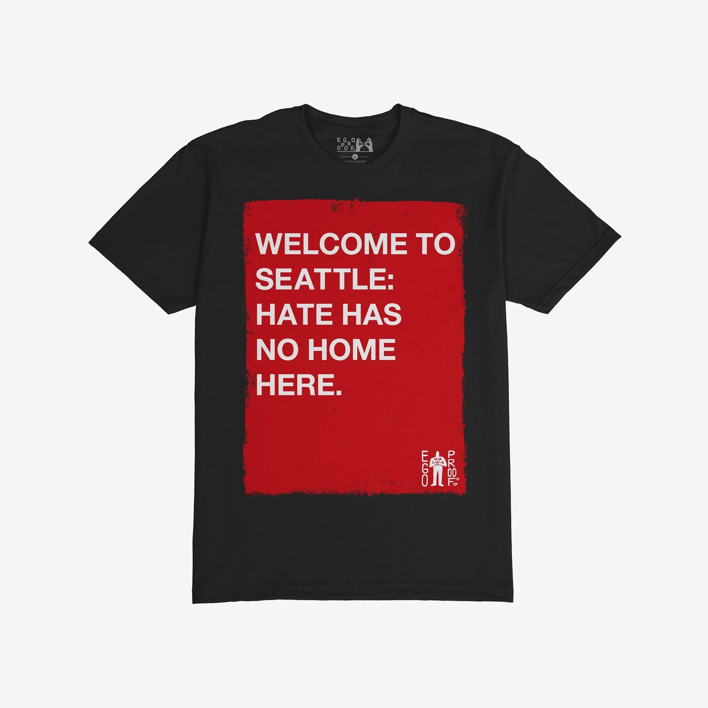 Custom Hate Has No Home Here T-shirt with a bold red rectangle featuring an inclusive message, perfect for promoting equity and justice. A small EGO PROOF. logo adds unique detail to this statement piece.
