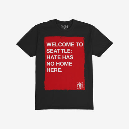 Custom Hate Has No Home Here T-shirt with a bold red rectangle featuring an inclusive message, perfect for promoting equity and justice. A small EGO PROOF. logo adds unique detail to this statement piece.