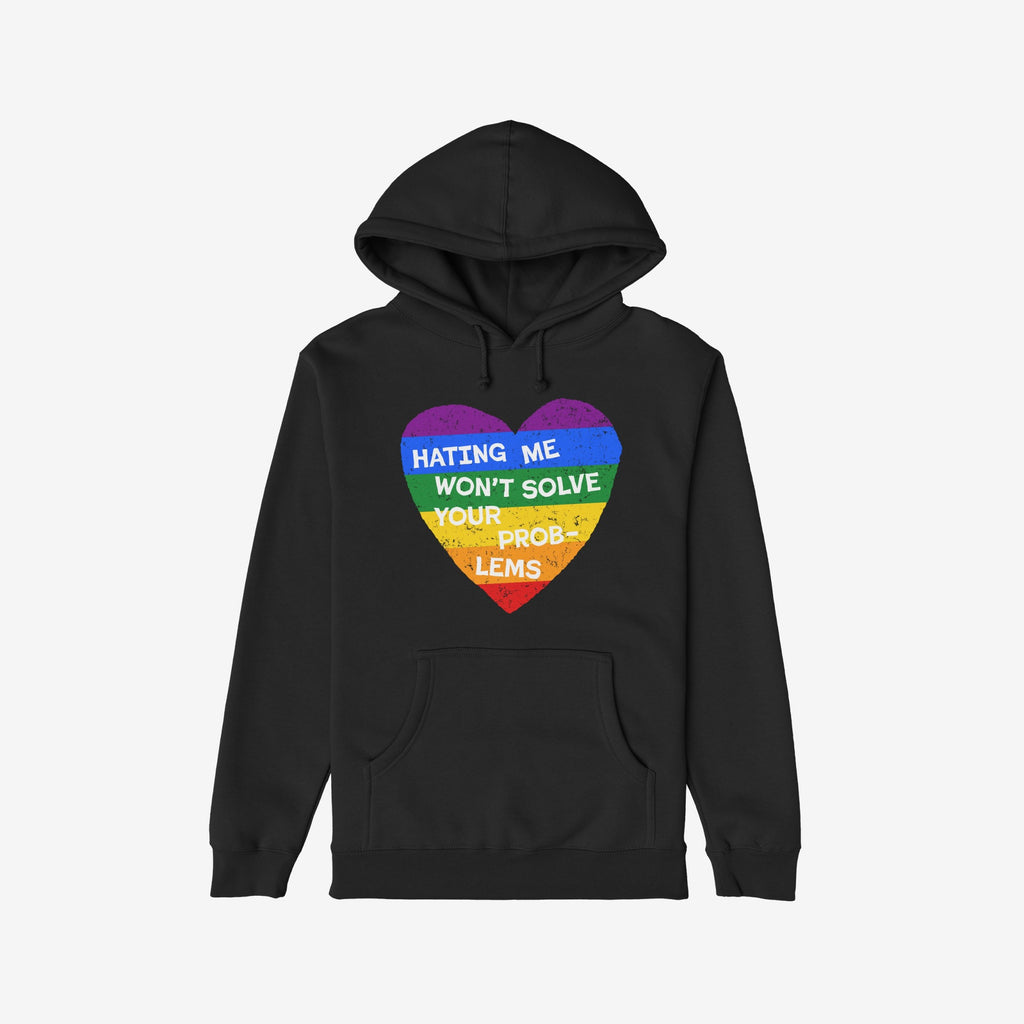 No LGBTQ Hate Shirt featuring a distressed-style rainbow heart on a black hoodie, emblazoned with the bold slogan “HATING ME WON’T SOLVE YOUR PROBLEMS,” embodying LGBTQ pride and resistance.