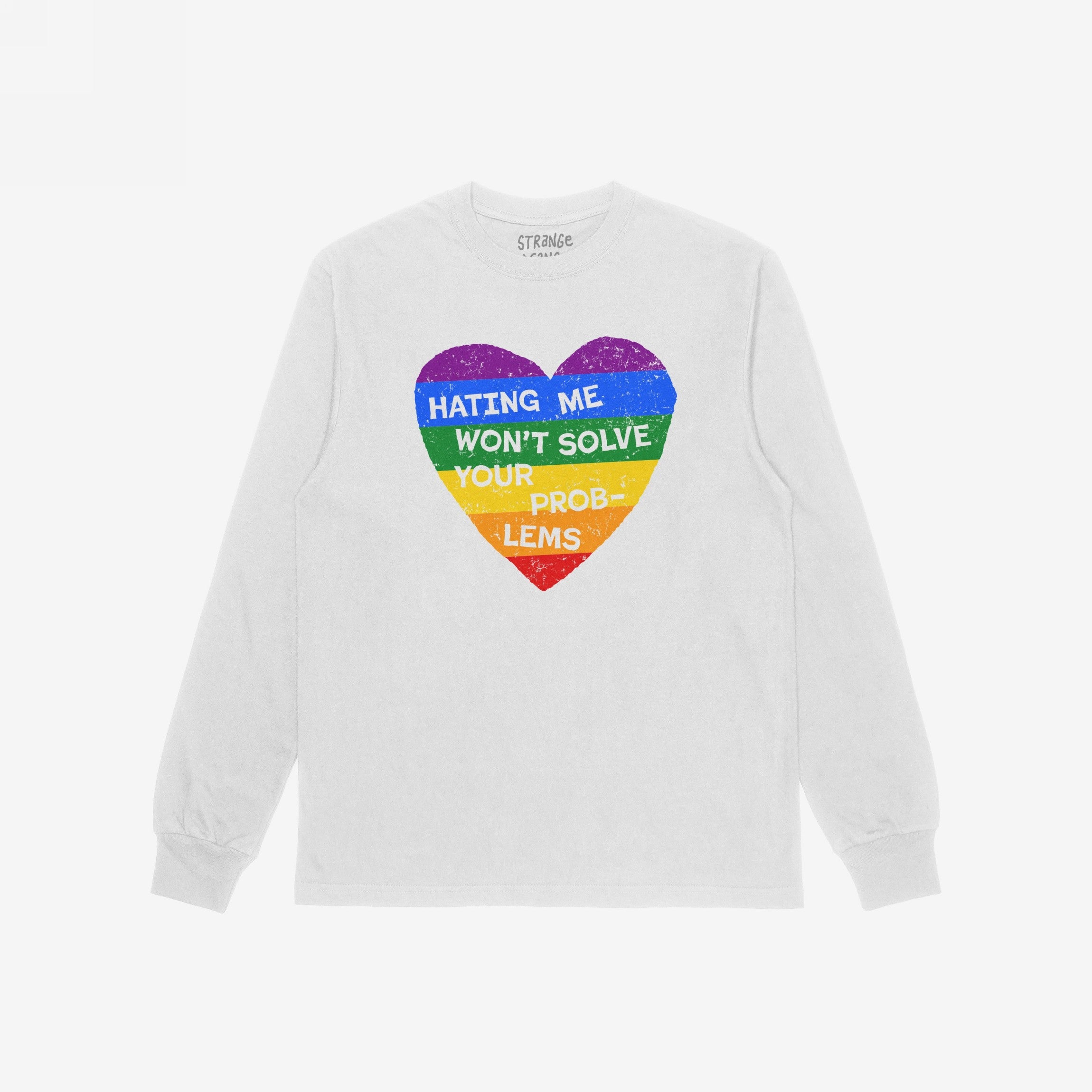 The No LGBTQ Hate Shirt features a white long-sleeved tee with a rainbow-striped heart and the slogan HATING ME WON’T SOLVE YOUR PROBLEMS, promoting pride and support for equality.