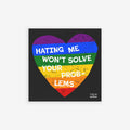 No LGBTQ Hate Sticker & Magnet features a grungy rainbow-striped heart with 'HATING ME WON’T SOLVE YOUR PROBLEMS' slogan, embodying LGBTQ+ pride and resilience, ideal for laptops or fridges.