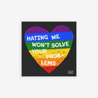 No LGBTQ Hate Sticker & Magnet features a grungy rainbow-striped heart with 'HATING ME WON’T SOLVE YOUR PROBLEMS' slogan, embodying LGBTQ+ pride and resilience, ideal for laptops or fridges.
