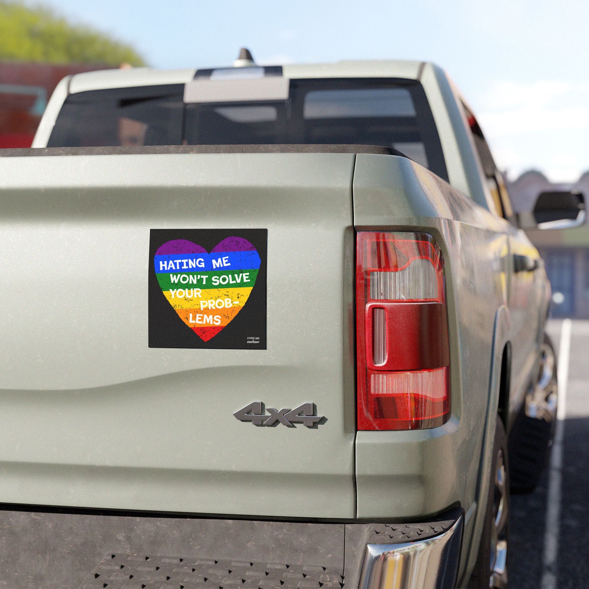 The No LGBTQ Hate Sticker & Magnet features a rainbow heart with “HATING ME WON’T SOLVE YOUR PROBLEMS” on a light 4x4 truck, showcasing resilience and allyship.