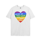 The No LGBTQ Hate Shirt features a distressed rainbow heart with “HATING ME WON’T SOLVE YOUR PROBLEMS” slogan, promotin