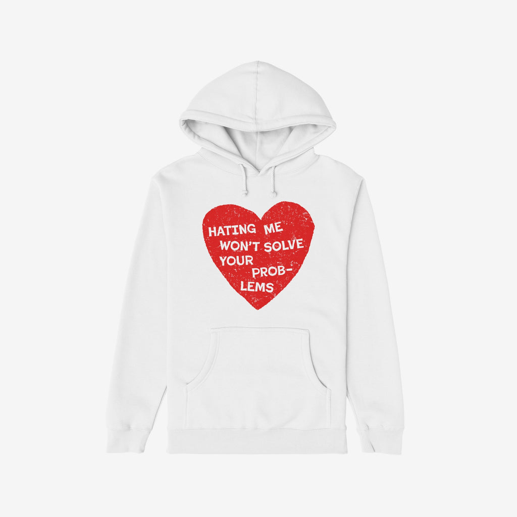 White pullover hoodie featuring the No Hate Shirt design, showcasing a distressed red heart with the message: Hating Me Won’t Solve Your Problems, symbolizing support for equality and dignity.