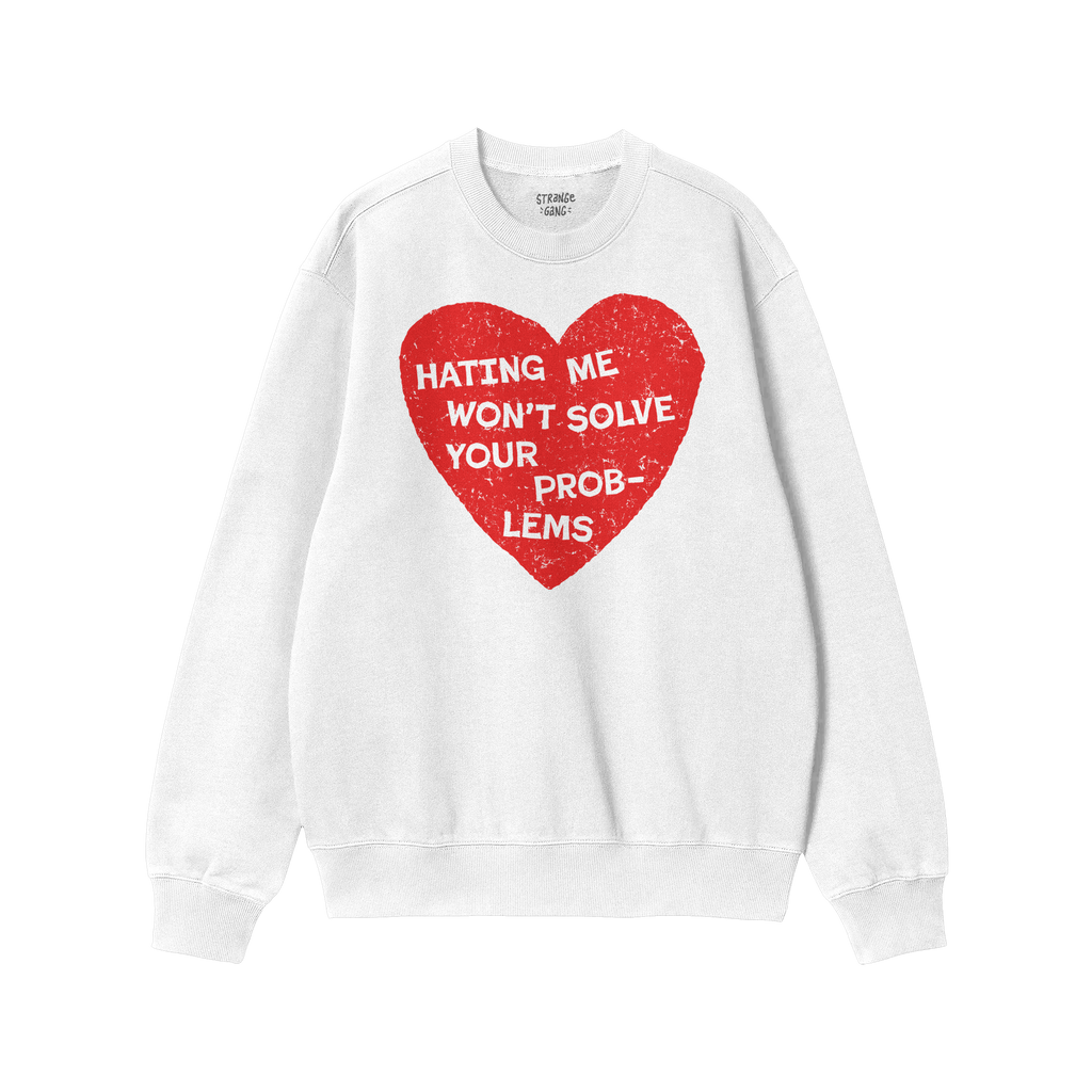 White crew-neck sweatshirt featuring a bold red heart with distressed edges, emblazoned with the phrase HATING ME WON’T SOL