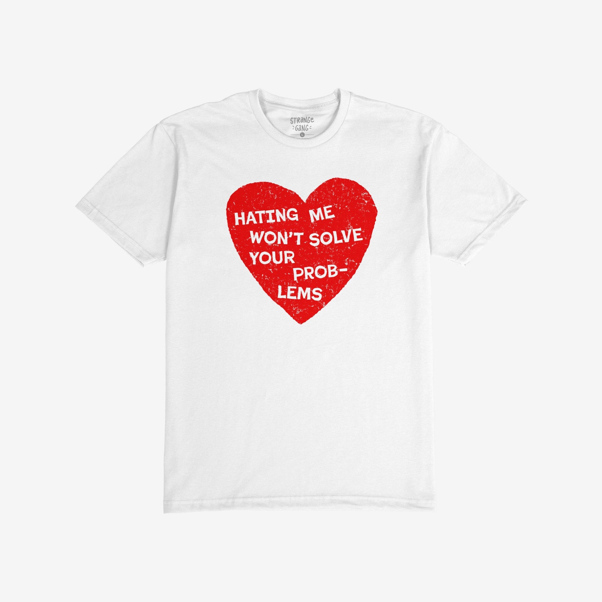 No Hate Shirt displaying a distressed red heart with bold white text: “Hating Me Won’t Solve Your Problems.” Features collaboration label inside collar, symbolizing support for equality and LGBTQ rights.